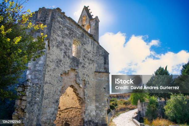 Abandoned Remains Of The Monastery Of La Armedilla Xv Century With Sun Behind The Belfry Spain Stock Photo - Download Image Now