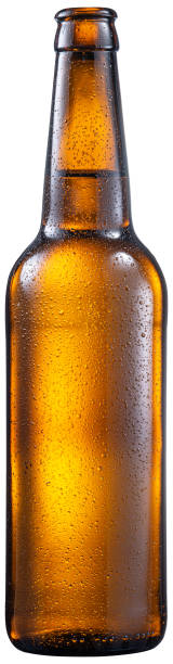 Opened bottle of cold beer with condensation isolated on a white background. File contains clipping path. Opened bottle of cold beer with condensation isolated on a white background. File contains clipping path. beer bottle photos stock pictures, royalty-free photos & images