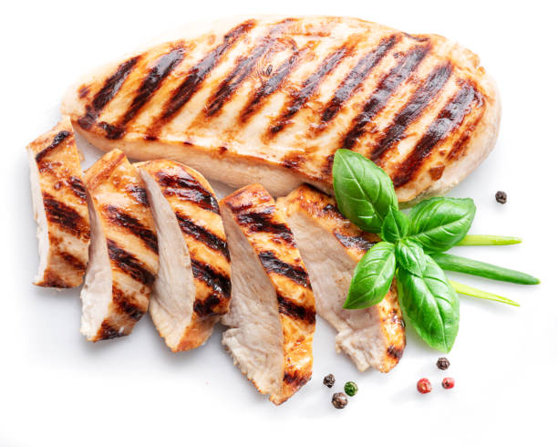 istock Grilled chicken fillet with herbs isolated on white background. 1342192935