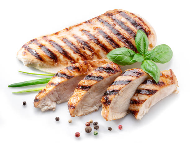 istock Grilled chicken fillet with herbs isolated on white background. 1342192945