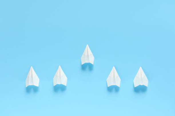 istock One paper airplane take the lead. 1342201176
