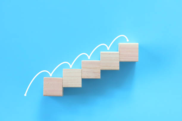 istock Jump on the stairs made of stacking blocks. 1342201983