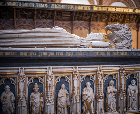Beautiful sarcophagus of Queen Margrete I (1353-1412) in Roskilde Cathedral. \nRoskilde Cathedral was opened in 1175 when Denmark was still catholic. With the reformation in 1536 Denmark became protestant. Most Danish kings and queens are buried in the cathedral, which is on the UNESCO World Heritage list.