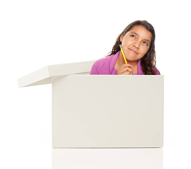 istock Ethnic Female Popping Out and Thinking Outside The Box 134220427