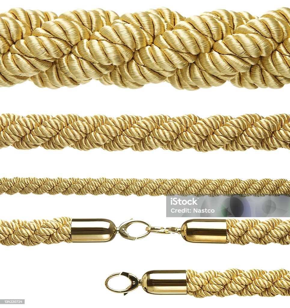 Gold cordas isoladas no branco - Foto de stock de Corda royalty-free