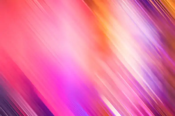 Photo of Abstract gradient colorful blurry lines pink purple motion blur stripes rainbow color background