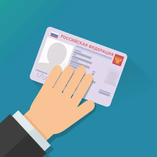 Vector illustration of A hand presents an Identity card of the Russian Federation ((РОССИЙСКАЯ ФЕДЕРАЦИЯ in Russian) (flat design)