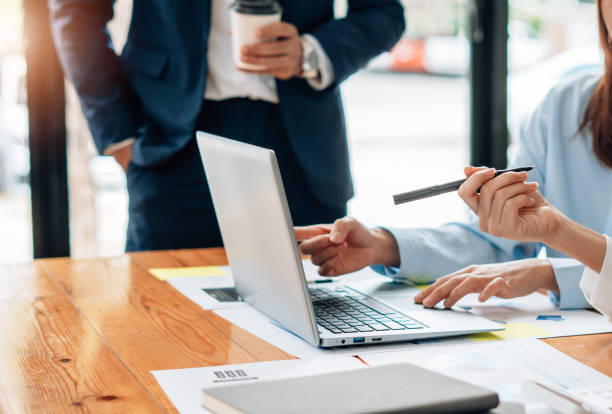 istock Business team meeting to conference, collaboration discussing working analyzing with financial data and marketing business strategy project, presentation and brainstorming to making profit of company 1342217602