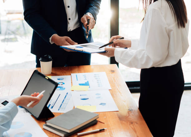 istock Business team meeting to conference, collaboration discussing working analyzing with financial data and marketing business strategy project, presentation and brainstorming to making profit of company 1342218416