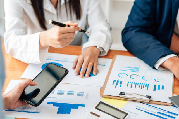 istock Business team meeting to conference, collaboration discussing working analyzing with financial data and marketing business strategy project, presentation and brainstorming to making profit of company 1342219029