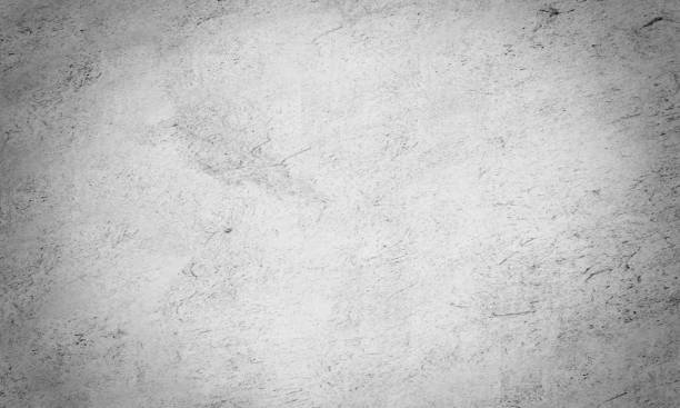 istock Black and white loft atmospheric concrete wall texture with Vignette  use for wallpaper or background. White plaster. 1342221867