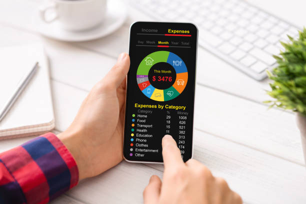 istock Unrecognizable guy checking monthly expenses on smartphone 1342222193