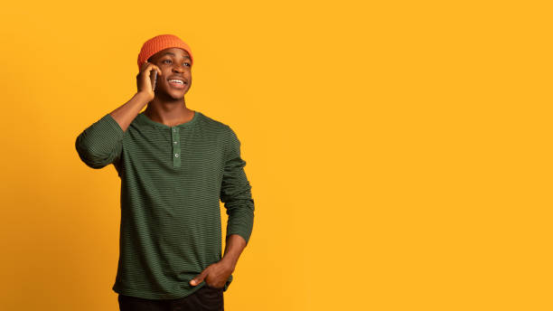 istock Mobile Call. Happy Young Black Man Talking On Cellphone 1342223152