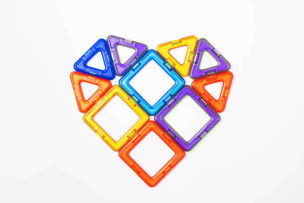 istock Heart made from the figures of a children magnetic constructor on white background. 1342225944