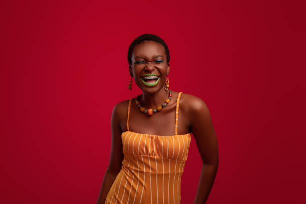 istock Attractive black lady laughing and looking at camera 1342228506