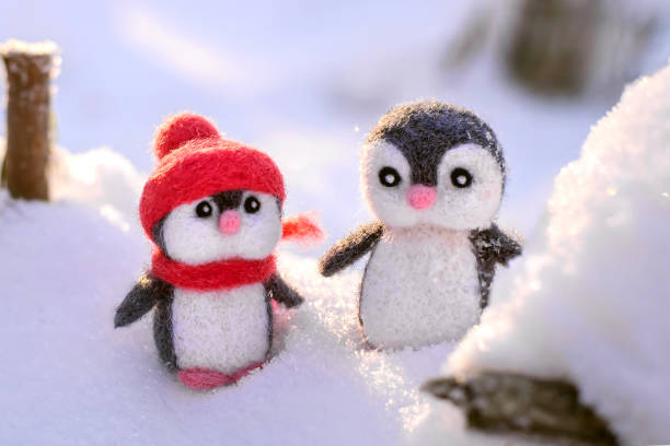 istock Handmade cute toy penguins made of wool 1342229068