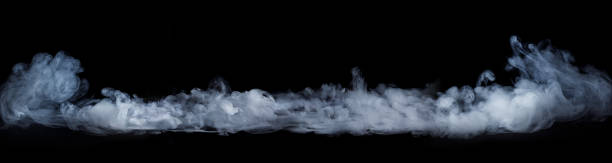 istock Abstract white smoke moves on black background. Beautiful swirling smoke. 1342233581