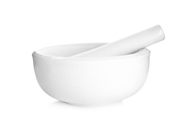 istock New ceramic mortar with pestle isolated on white. Cooking utensils 1342234468