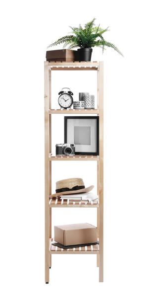 istock Wooden shelving unit with different items isolated on white 1342234677