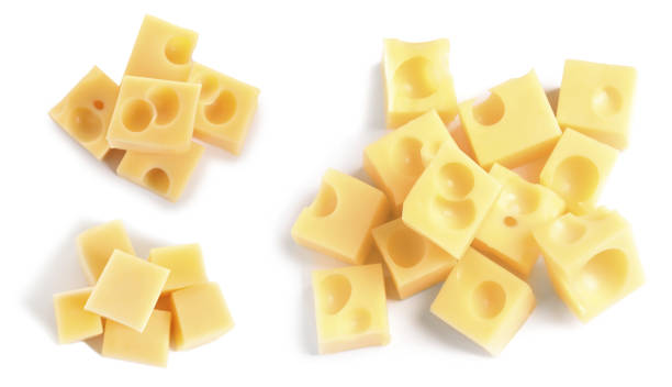 istock Set of delicious cheese cubes on white background, top view 1342235491