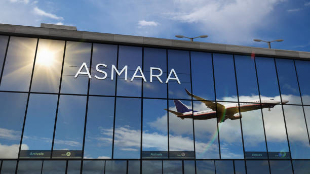istock Airplane landing at Asmara Eritrea airport mirrored in terminal 1342236634