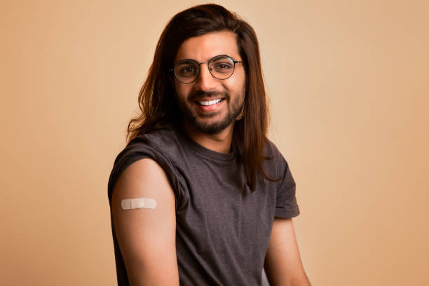 istock Closeup of handsome arab guy posing after vaccination 1342237195