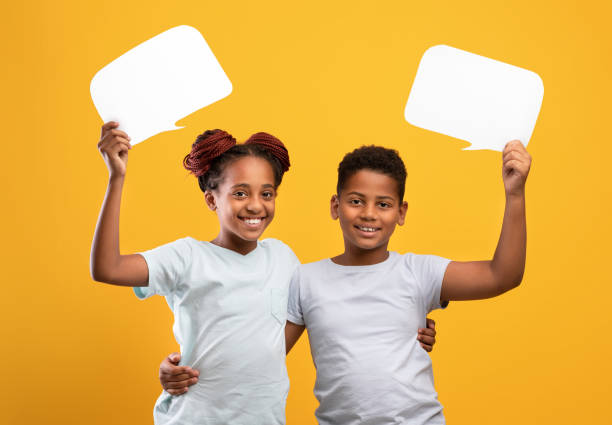 istock Positive afro-american brother and sister with communicative bubbles 1342237851