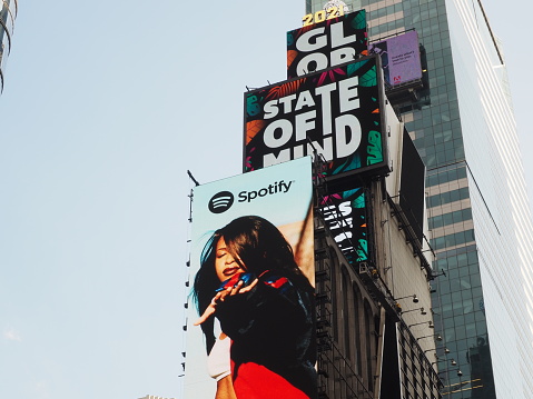 New York City, New York United States - August 29 2021: Spotify billboard advertisement in  Times Square with logo.