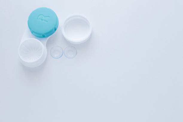 istock A container for lenses and two contact lenses lie on the side 1342238173