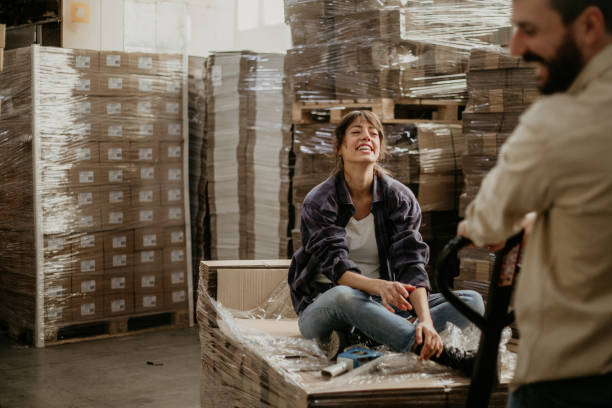 istock Coworkers have fun in the warehouse 1342240969