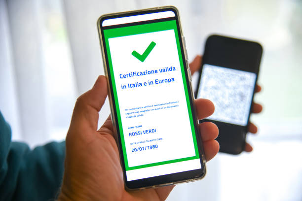 istock Checking the green pass on smartphone. Required for indoor tables in bar and restaurants, events and to access workplaces and company canteens. Valid certification.  Milan, Italy - September 2021 1342242182
