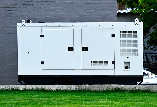 White diesel mobil electric generator on street