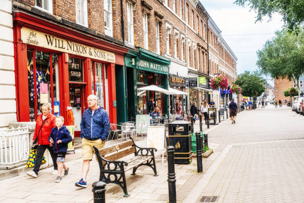 Carlisle, United Kingdom: September 04, 2021: Street scene looking east along Bank Street past Nixon's Pet Shop in the city of Carlisle in the north of England.