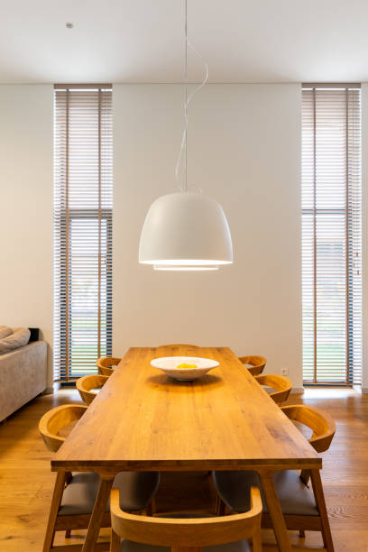 Large wooden dining table with chair