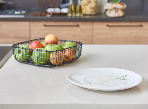 istock Kitchen brass utensils, chef accessories. Hanging copper kitchen with white tiles wall 1342246969