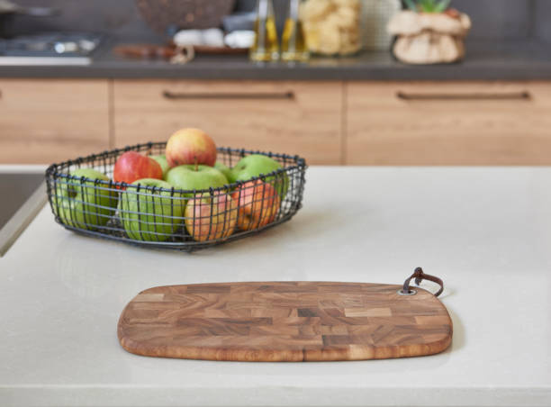 istock Kitchen brass utensils, chef accessories. Hanging copper kitchen with white tiles wall 1342247057