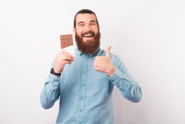 istock I like this chocolate bar. Bearded man recommends one. 1342248294