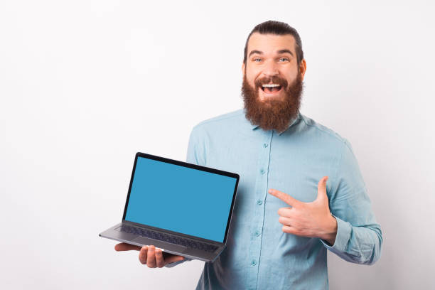 istock Check out this offer the bearded man is pointing at on the laptop screen. 1342248339