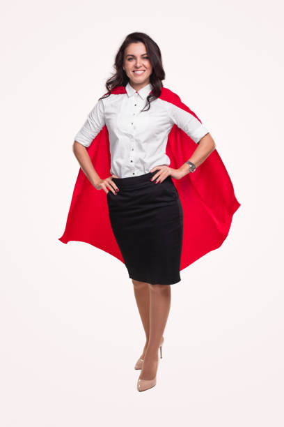 istock Confident woman in superhero cape 1342248466