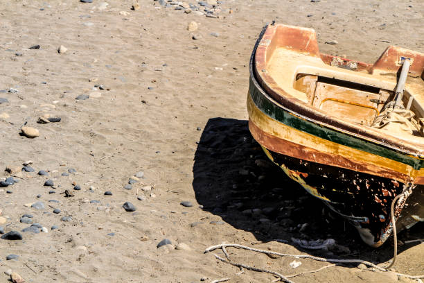 istock Old abandoned boat on the beach in Spain 1342248873