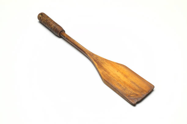 istock Old wood spatula for cooking on white background 1342249742