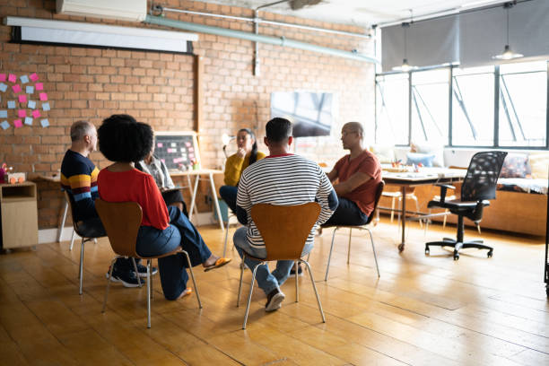 istock People in group therapy at a coworking 1342251840