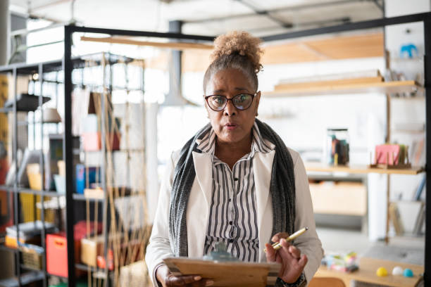 istock Senior psychologist or leader talking in a coworking 1342252042