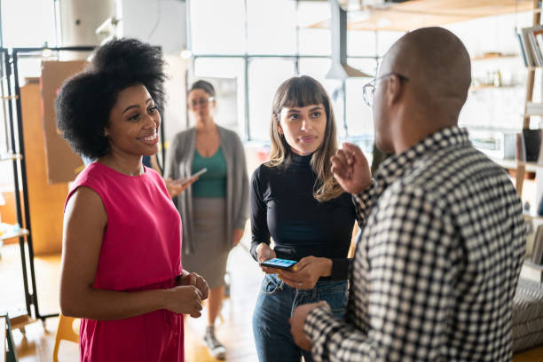 istock Colleagues talking after work at a coworking 1342254617