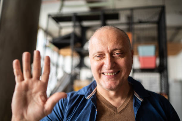 istock Mature man in a video call at work 1342255438