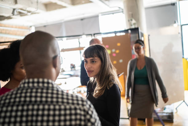 istock Colleagues talking after work at a coworking 1342256044