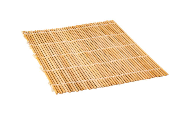 istock Bright bamboo mat for food isolated on the white background 1342258766