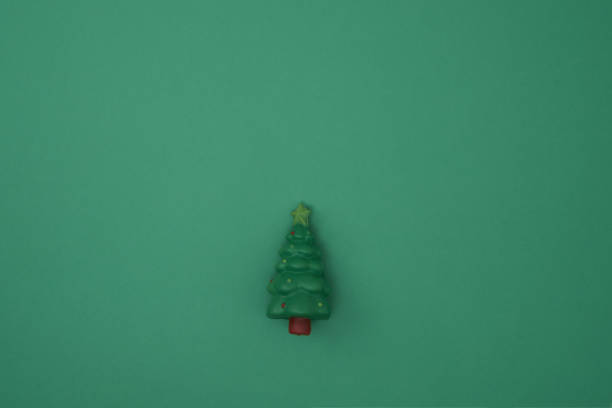 istock Toy tree green background. New Year's decor. Copy space, mock up. 1342259160