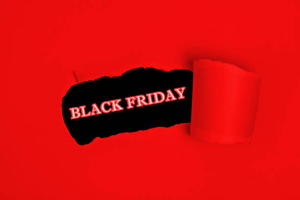 istock Red torn paper whole with black friday sale text promo 1342261948