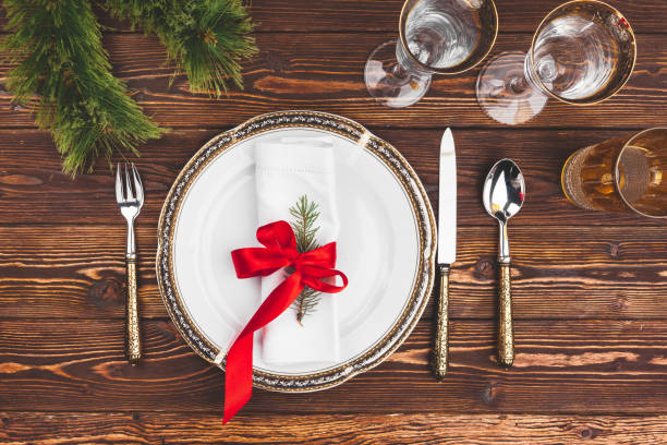 istock Brown wooden table with beautiful Christmas table setting 1342264976